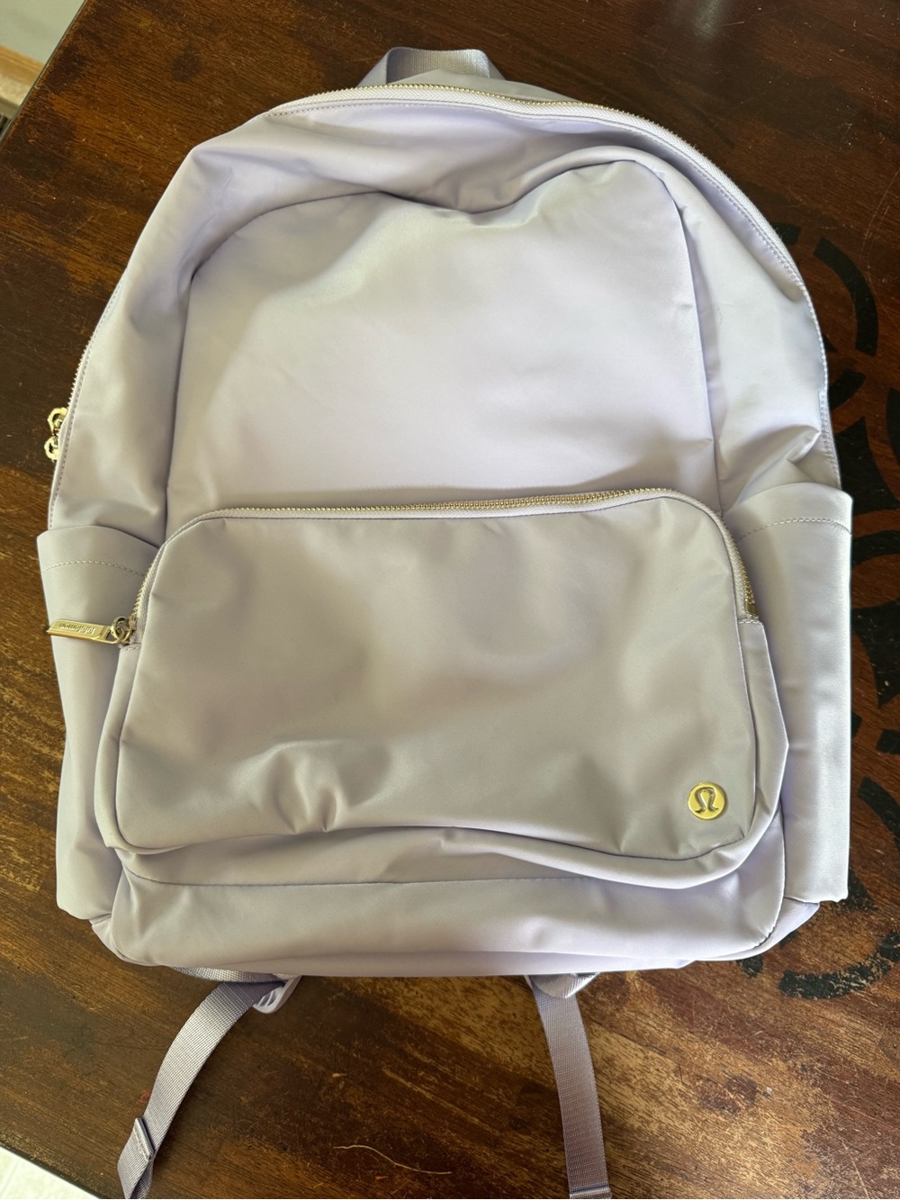 lululemon Everywhere Backpack in Lavender Frost with gold metal hardware.